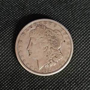 lot 100 image: 1921 Morgan Silver Dollar