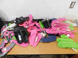 lot 54 image: Assortment of flip-flops