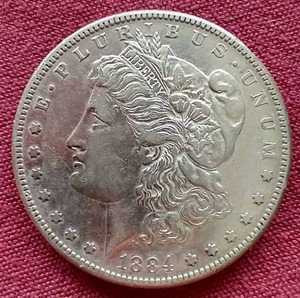 lot 51 image: 1884-S Morgan Dollar