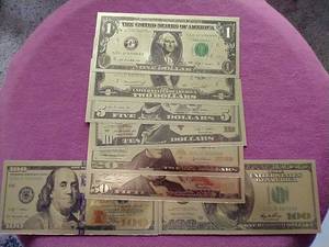 lot 57 image: Complete Set of (10) Gold-plated Foil Note Replicas