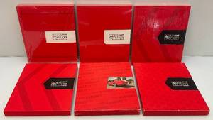 lot 62 image: Misc. Mecum Auto Auction Books
