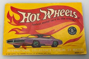lot 125 image: 1967 Hot Wheels International Collectors Catalog By Mattel  (In Protective Sleeve)