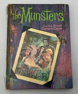 lot 145 image: 1965 MUNSTERS And The Great Camera Caper Hard Cover Book