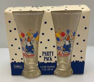 lot 198 image: 1987 SPUDS MACKENZIE Party Pack 4 Flare Pilsners In Original Pack