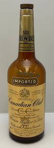 lot 312 image: Vintage Large Glass Canadain Club Whiskey Bottle 19 Tall (Has Cap)