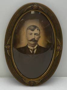 lot 346 image: Antique Bubble Glass Oval Framed Picture Of A Man 15 x 23