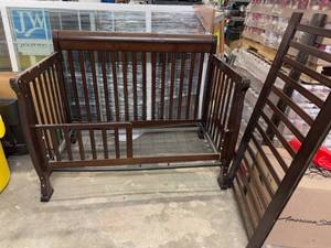 lot 10 image: Convertible Crib to Toddler Bed Spring is a little bent