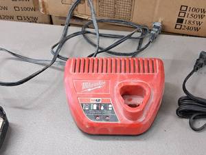 lot 825 image: Milwaukee M12 Cordless Tool Battery Charger