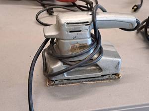 lot 721 image: Kmart Orbital Sander