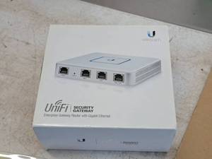 lot 766 image: Ubiquity UniFi Security Gateway Enterprise Gateway Router with Gigasbit Ethernet