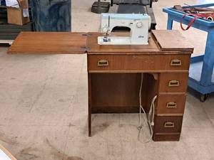lot 1025 image: Sewing Machine Table with Elna Sewing Machine