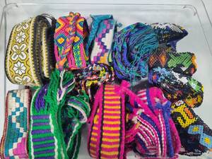 lot 131 image: Lot of Woven & Beaded Belts