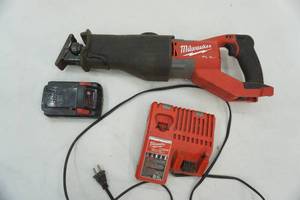 lot 90 image: Milwaukee Sawzall with battery & Charging Block