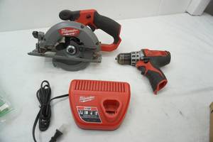 lot 193 image: Milwaukee DrillDriver, Circular Saw & M12 Charging Block