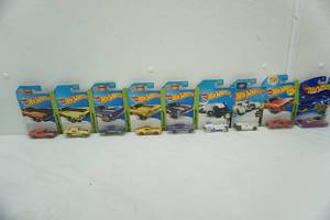 lot 211 image: Hot Wheels (9ct) unopened. Most are HW Workshop