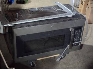 lot 3 image: GE Over-the-Range Microwave Oven, Model JVM7195EK3ES