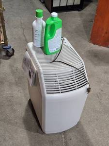 lot 6 image: Used Bemis Waterwick Model 826-800 Humidifier with Care Products