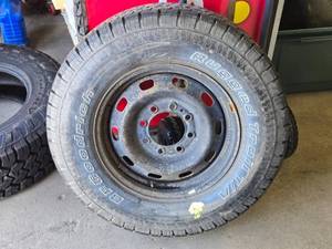 lot 13 image: BF Goodrich Rugged Trail Tire on Steel Rim LT26570 R17