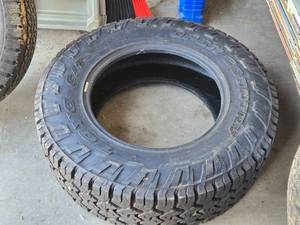 lot 14 image: Toyo Open Country AT II Tire 27570R18