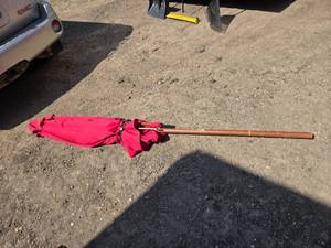 lot 51 image: Red Patio Umbrella with Wooden Pole