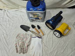 lot 79 image: Empty Roundup Jug, Flashlights, Small Shovels