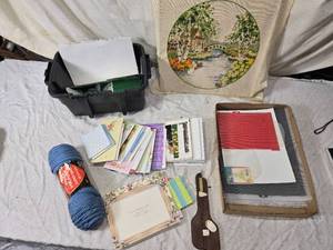 lot 119 image: Craft Supplies with Yarn, Patterns, and Cross-Stitch Pillow