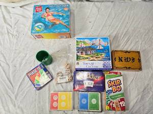 lot 122 image: Card Games and Inflatable Swim Chair and More