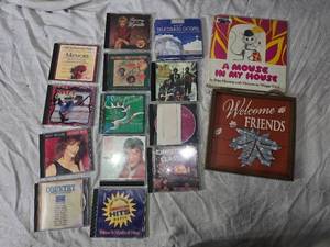 lot 125 image: CDs, Book and Decorative Sign