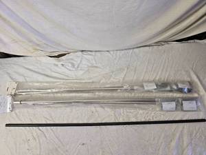 lot 143 image: Nickel Finish Curtain Rods with Hardware, Sepia Still Life Art, and Wire Shelves