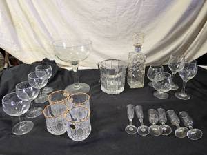 lot 166 image: Elegant Crystal Glassware including Wine and Champagne Glasses, Decanter, and Ice Bucket