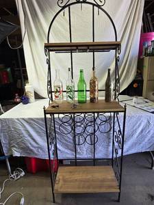 lot 174 image: Metal Wine Rack Stand with Assorted Decorative Glass Bottles and Cork Collection