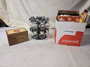 lot 191 image: Cookbooks, Spice Rack, and Limited Edition Cookie Tin