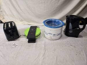 lot 192 image: Toaster, Waffle Maker, Crock-Pot, and Kettle