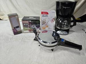 lot 194 image: Coffee Maker, Pizzelle Maker, Cherry Pitter, Pepper Mill, Cake Decoration Kit