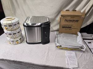 lot 200 image: Butterball Indoor Electric Turkey Fryer, Spice Rack, Gingerbread Baking Mold