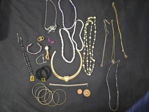 lot 204 image: Assorted Jewelry with Necklaces, Bracelets, and Tokens