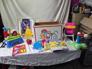 lot 250 image: Huge Lot of Toys Playskool Puzzle, Fisher Price Apple, and Beauty and the Beast Poster