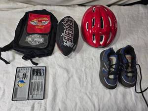 lot 259 image: Toys and Other Games with Roller Shoes, Helmet, Harley Davidson Backpack, Ball, and Darts