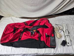 lot 262 image: Marlboro Duffel Bag with ShredStik Portable Paper Shredder