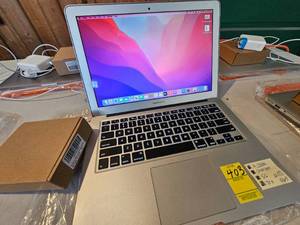 lot 403 image: REFURBISHED MACBOOK AIR