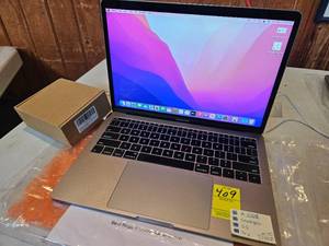 lot 409 image: REFURBISHED MACBOOK PRO