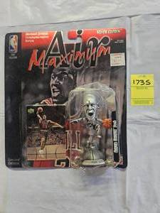 lot 1735 image: MICHAEL JORDAN SILVER EDITION ACTION FIGURE