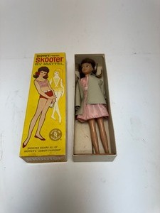 lot 73 image: Vintage Skooter Doll