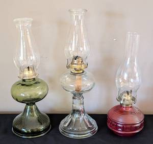 lot 94 image: Three Vintage Glass Oil Lamps