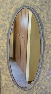lot 87 image: Large Fabric Covered Oval Wall Mirror