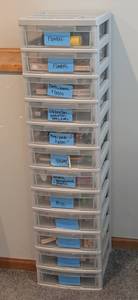 lot 49 image: Plastic Storage Container of Scrapbook Stamps