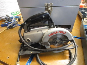 lot 24 image: Porter Cable trim saw 314...