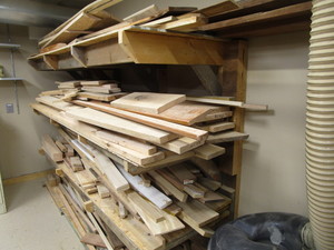 lot 50 image: Wall rack of craft wood shorts & p...