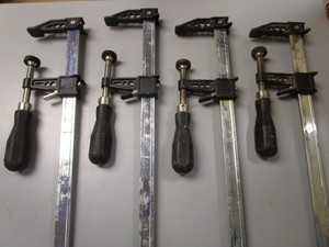 lot 42 image: Sure Foot clamps, Two 18 and Two 2...