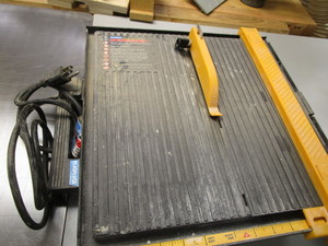 lot 74 image: Plasplug tile saw, diamond wheel we...